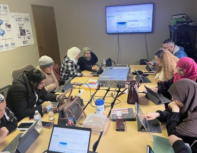 Students in a hands-on IT training session